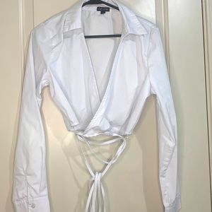 white v-neck long sleeve crop top with a adjustable crisscross string